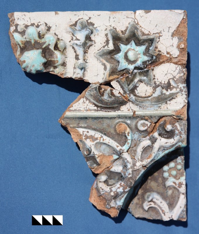Fragment of the costly multicoloured glazed ceramic plaque 2